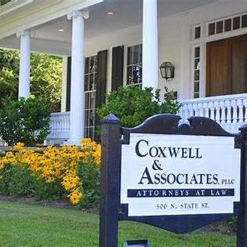 A sign in front of a house

AI-generated content may be incorrect.