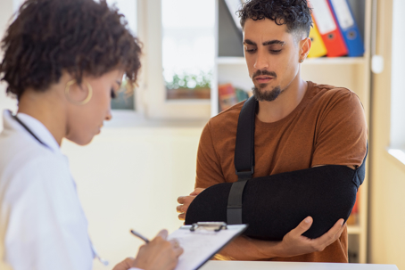 Doctor at hospital prescribing treatment