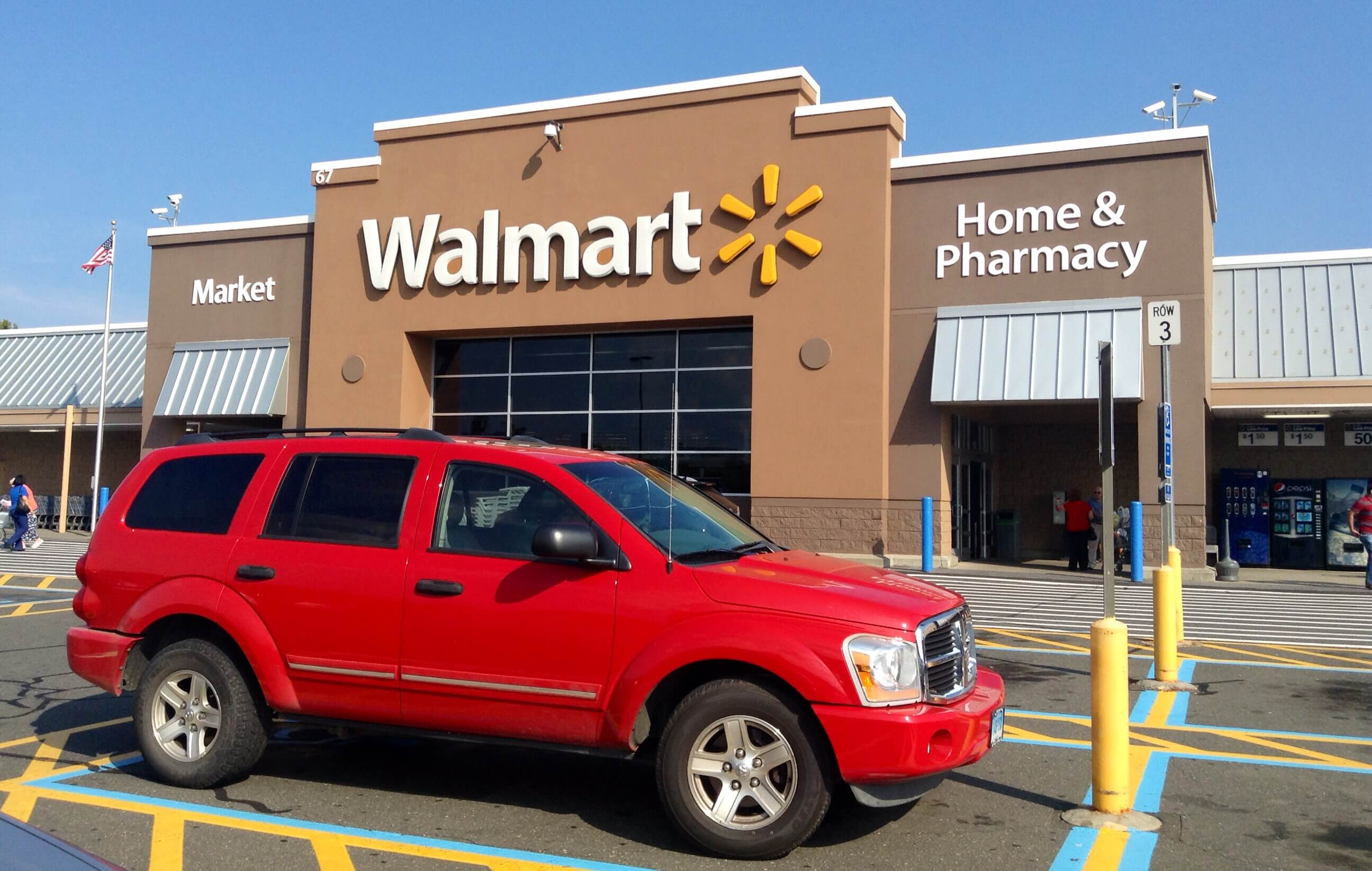 Red SUV in front of Walmart
