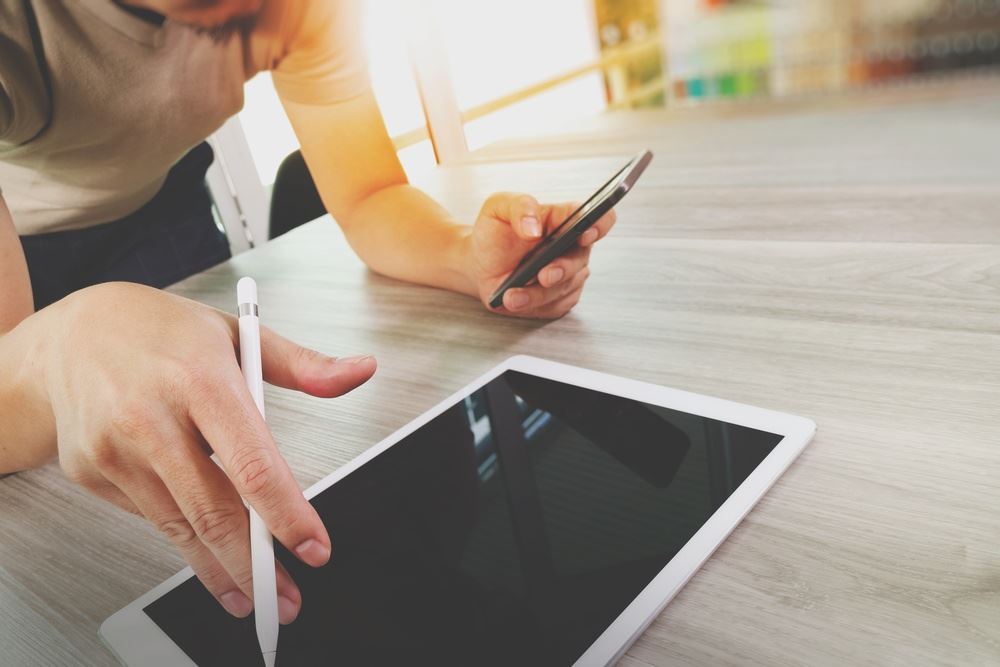 Designer working on digital tablet