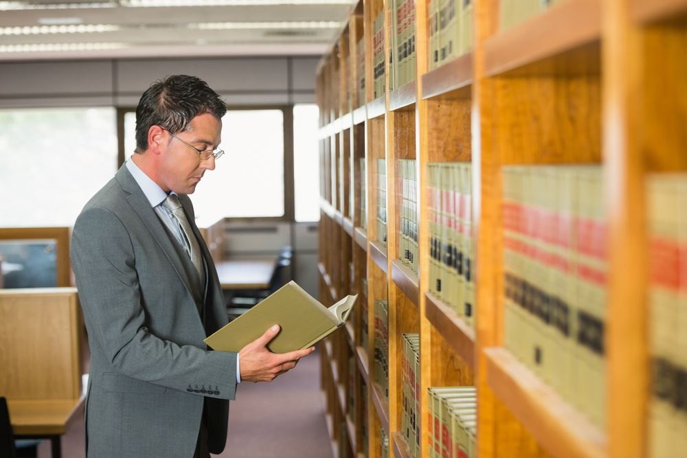 Lawyer reading book