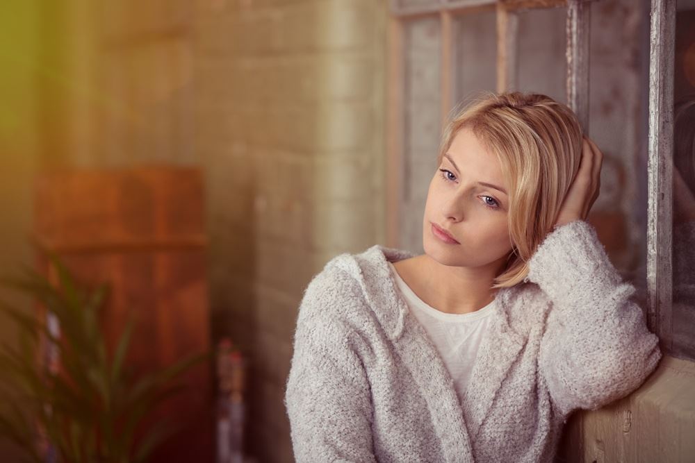 Young Lady With Hands On Head