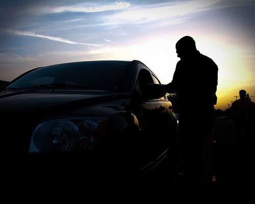 Man looking at the car