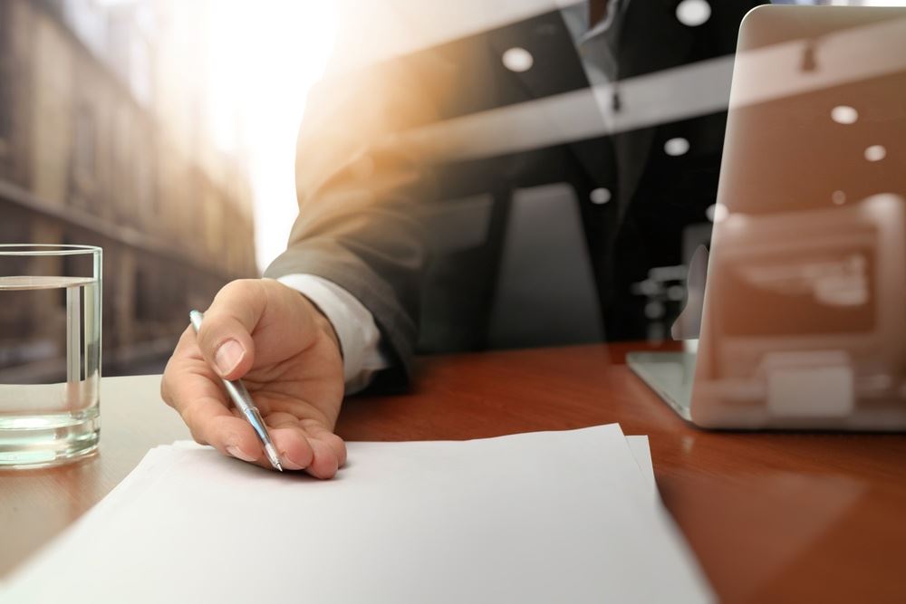 man with documents