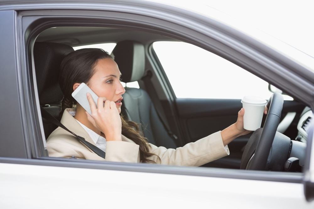 Woman on the phone while driving